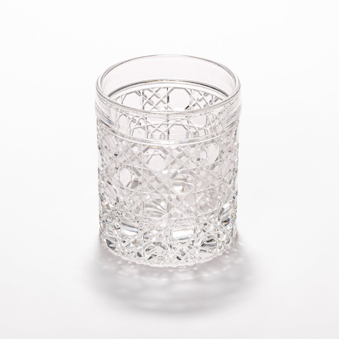Rocks glass with lattice cut design, perfect for serving whiskey or spirits with a sophisticated touch.