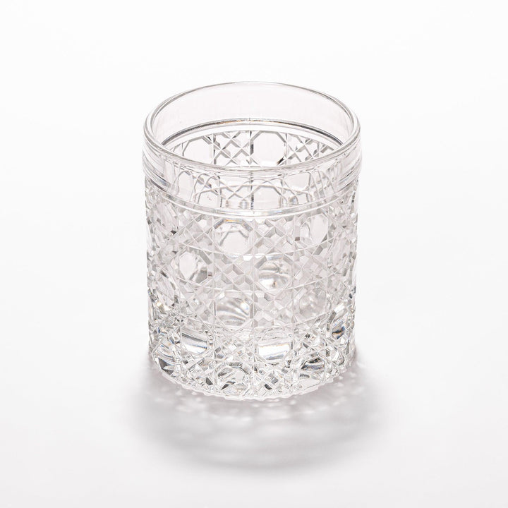 Rocks glass with lattice cut design, perfect for serving whiskey or spirits with a sophisticated touch.