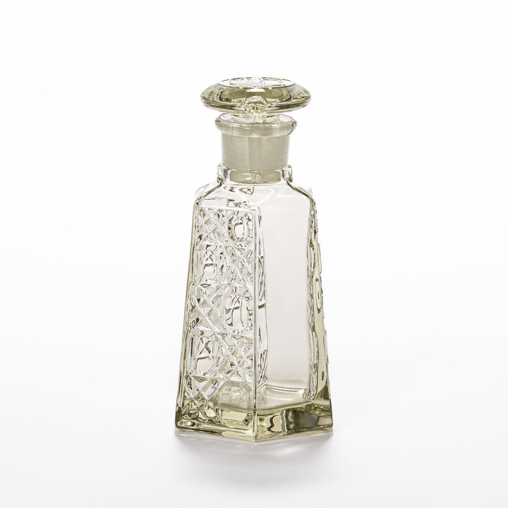 Stylish soy sauce dispenser with a geometric lattice cut design, featuring a smooth pour spout and elegant hexagonal base.