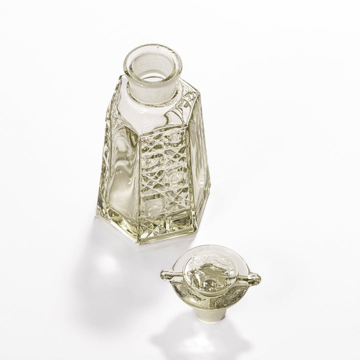 Stylish soy sauce dispenser with a geometric lattice cut design, featuring a smooth pour spout and elegant hexagonal base.