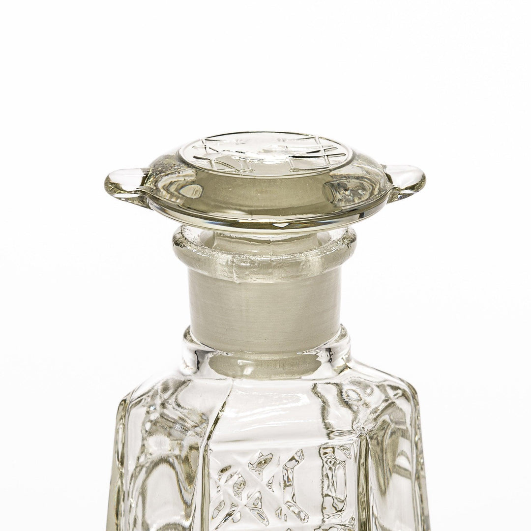 Stylish soy sauce dispenser with a geometric lattice cut design, featuring a smooth pour spout and elegant hexagonal base.