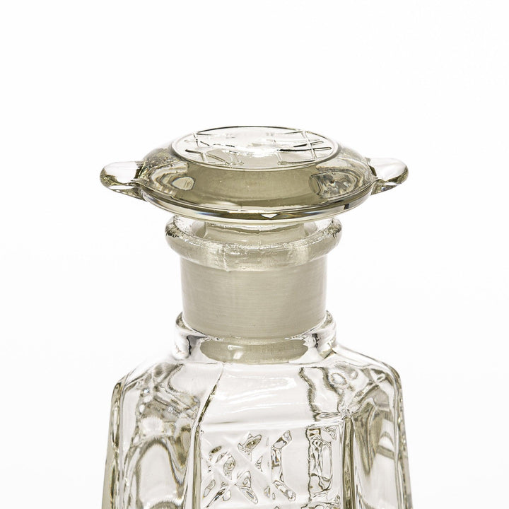 Stylish soy sauce dispenser with a geometric lattice cut design, featuring a smooth pour spout and elegant hexagonal base.