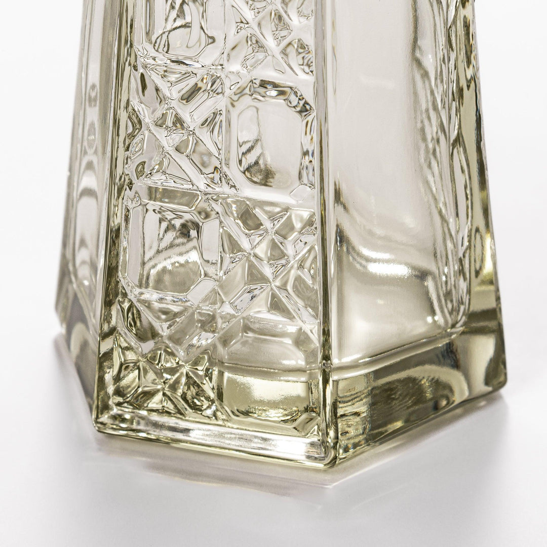 Stylish soy sauce dispenser with a geometric lattice cut design, featuring a smooth pour spout and elegant hexagonal base.