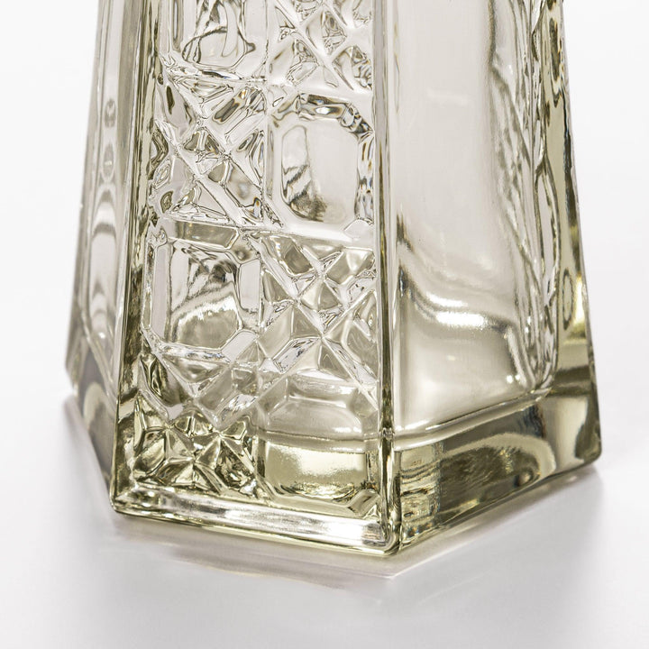 Stylish soy sauce dispenser with a geometric lattice cut design, featuring a smooth pour spout and elegant hexagonal base.