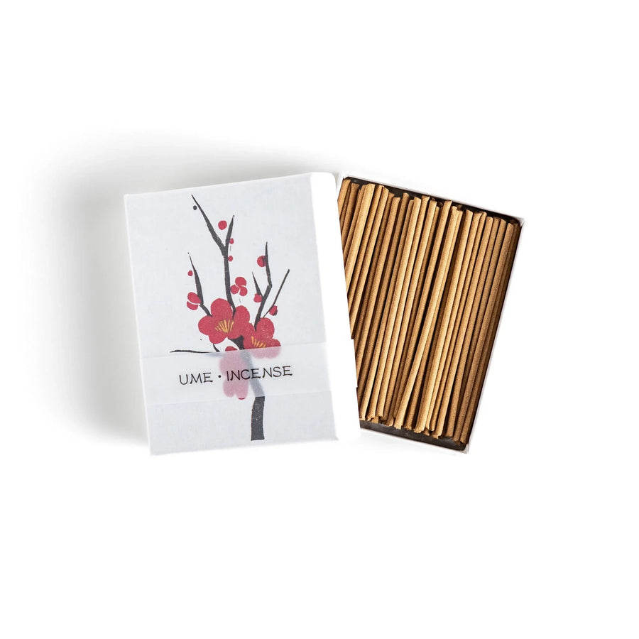 Japanese plum blossom incense with warm brown sticks in illustrated box offering sweet subtle floral fragrance.