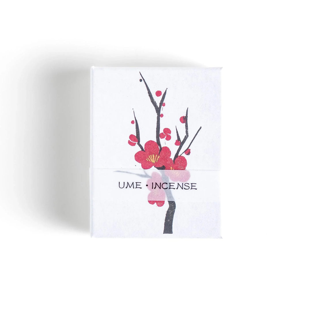 Japanese plum blossom incense with warm brown sticks in illustrated box offering sweet subtle floral fragrance.