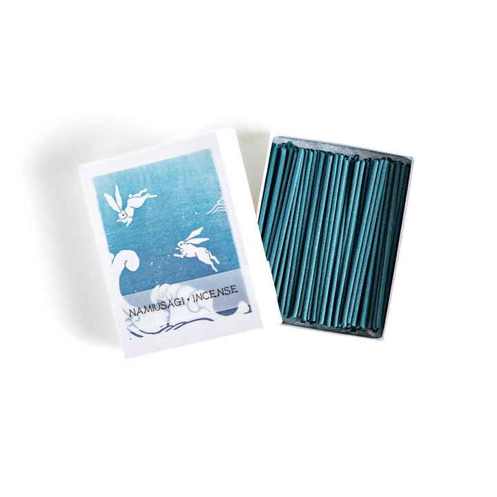 Blue incense sticks in a box with Japanese wave and rabbit design offering a refreshing and calming scent.
