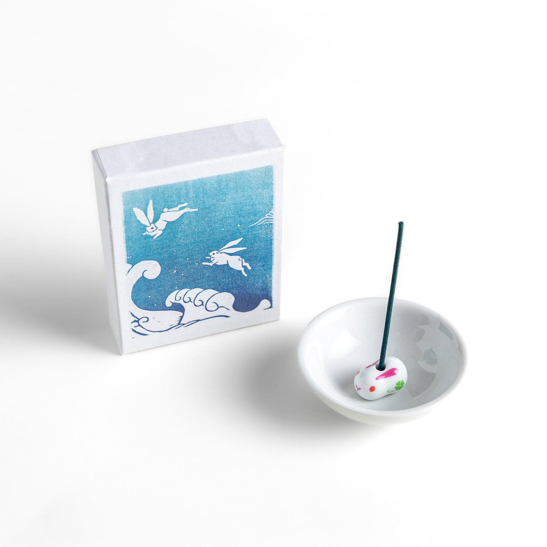 Blue incense sticks in a box with Japanese wave and rabbit design offering a refreshing and calming scent.