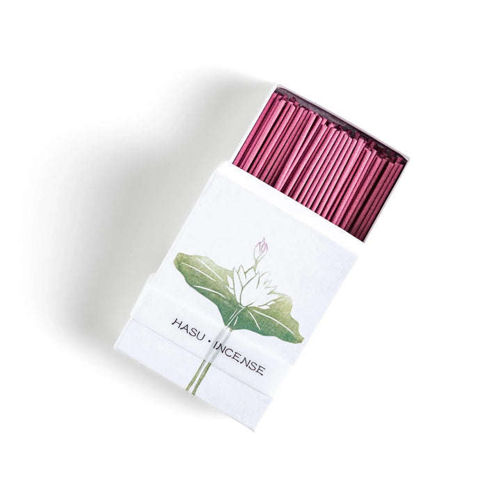 Pink incense sticks in lotus motif box offering a gentle floral fragrance creating a calm and serene mood.