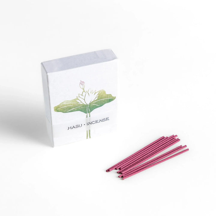 Pink incense sticks in lotus motif box offering a gentle floral fragrance creating a calm and serene mood.