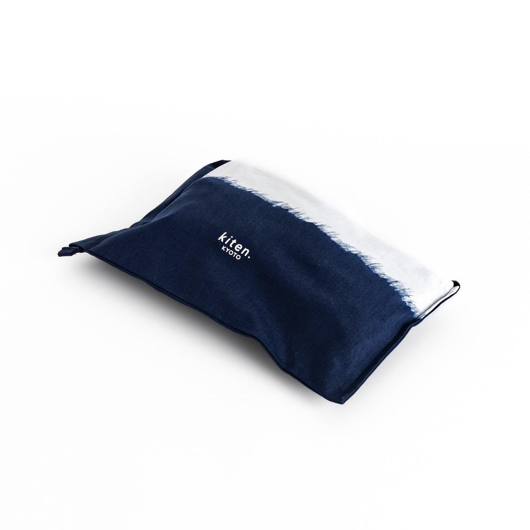 Stylish navy blue Japanese apron from our kitchen linens collection, featuring pockets and adjustable straps.