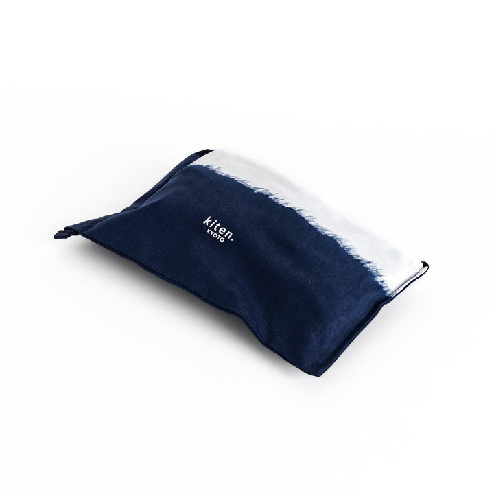 Stylish navy blue Japanese apron from our kitchen linens collection, featuring pockets and adjustable straps.