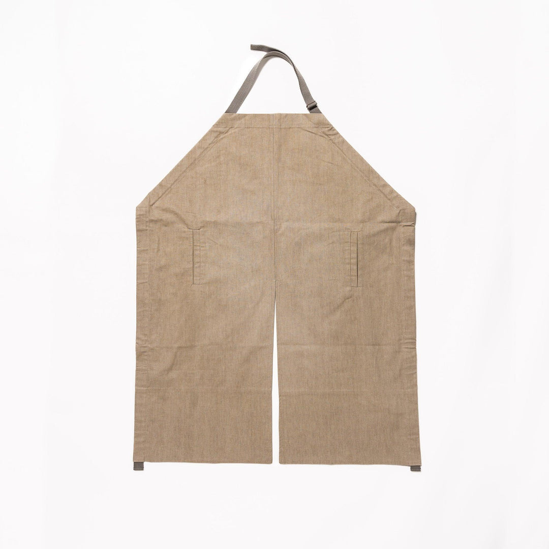 Elegant beige Japanese apron from our kitchen linens collection, designed with pockets and adjustable straps.