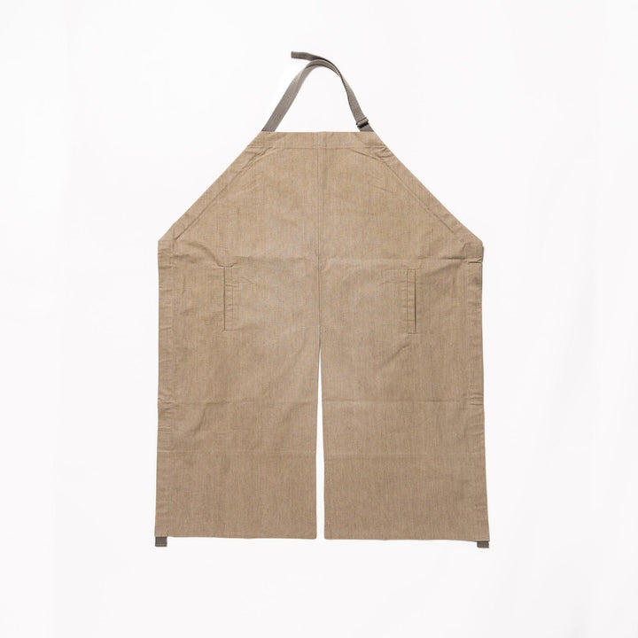 Elegant beige Japanese apron from our kitchen linens collection, designed with pockets and adjustable straps.