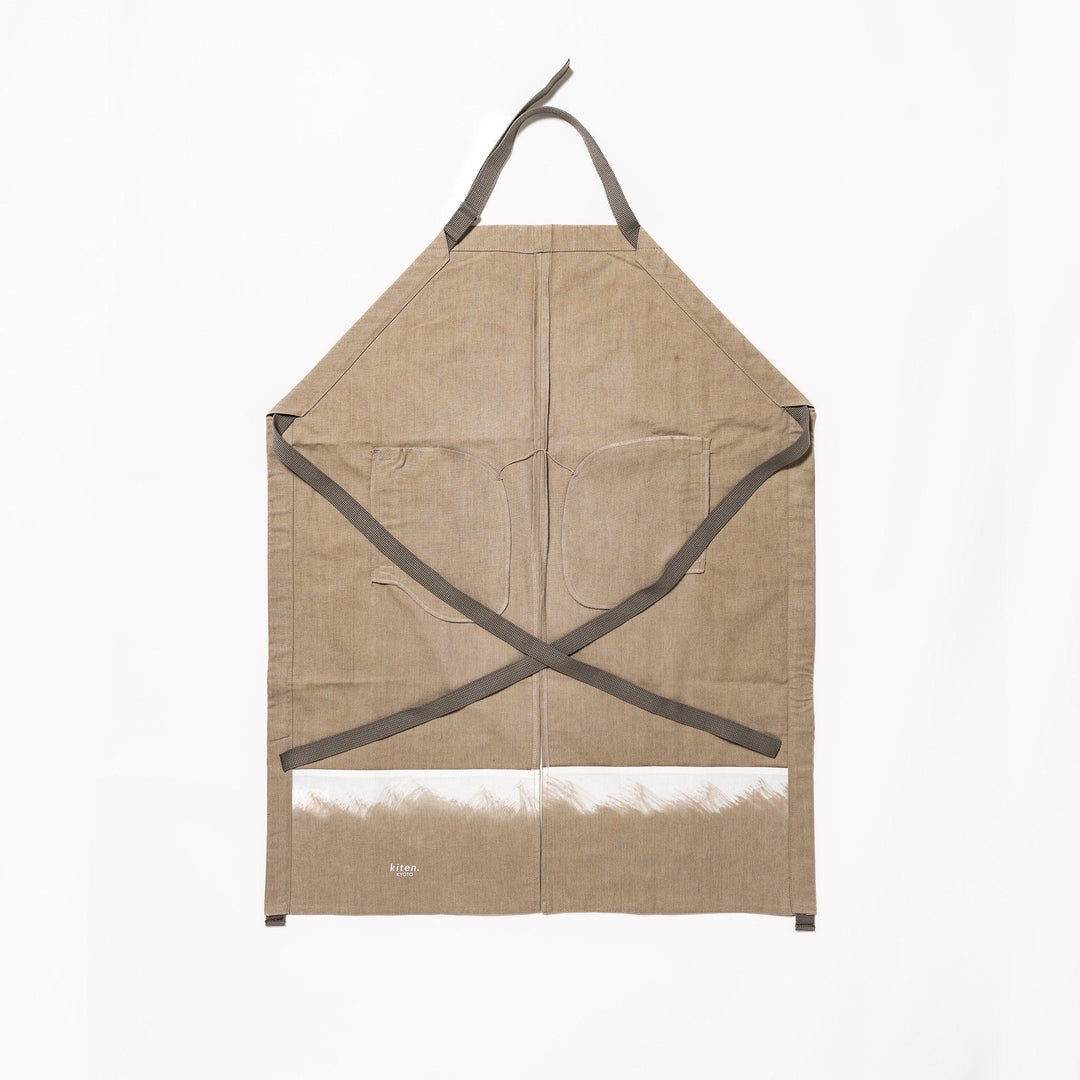 Elegant beige Japanese apron from our kitchen linens collection, designed with pockets and adjustable straps.