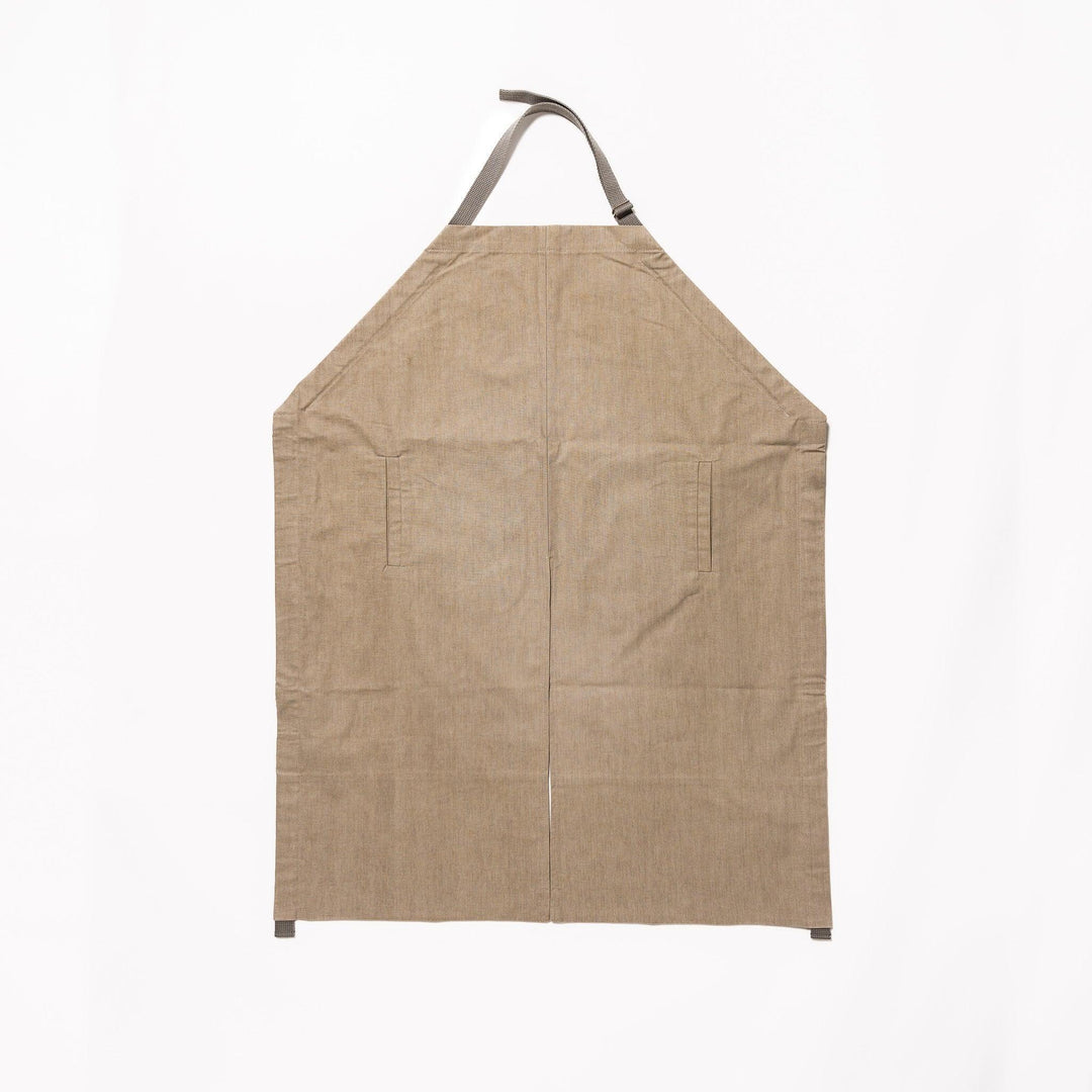 Elegant beige Japanese apron from our kitchen linens collection, designed with pockets and adjustable straps.