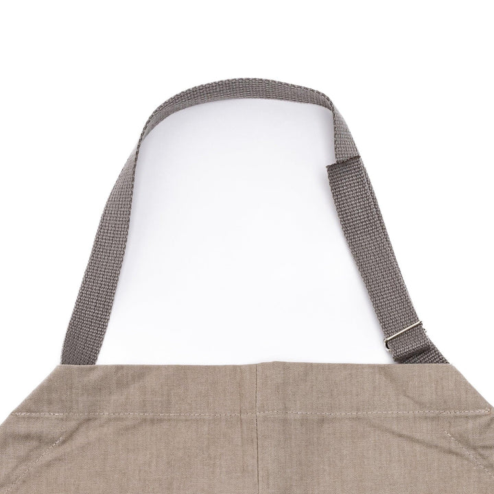Elegant beige Japanese apron from our kitchen linens collection, designed with pockets and adjustable straps.