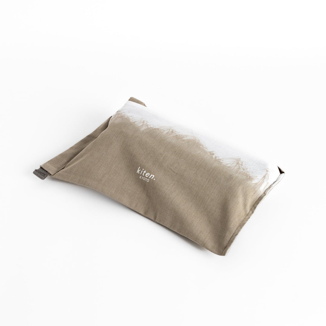 Elegant beige Japanese apron from our kitchen linens collection, designed with pockets and adjustable straps.