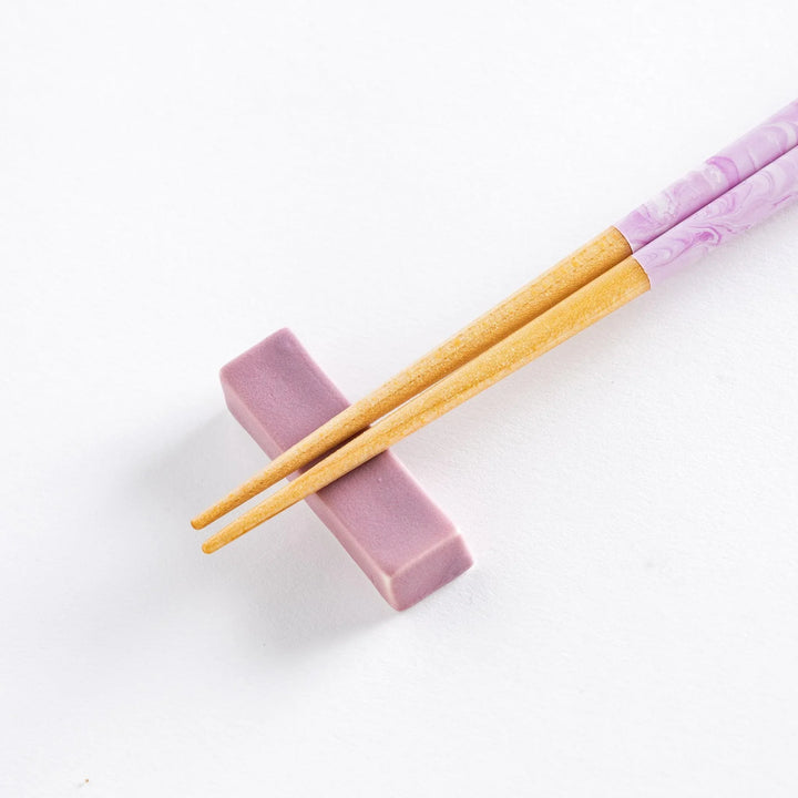 Lavender Breeze Fusion Chopsticks on a soft lavender rest, highlighting the beautiful design and functionality.