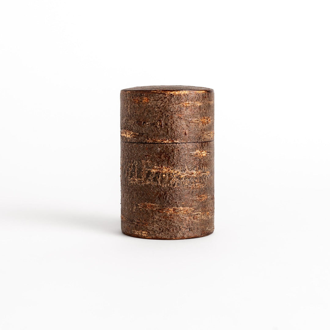 Rustic cherry bark tea canister with deep brown finish and texture ideal for storing loose leaf tea.