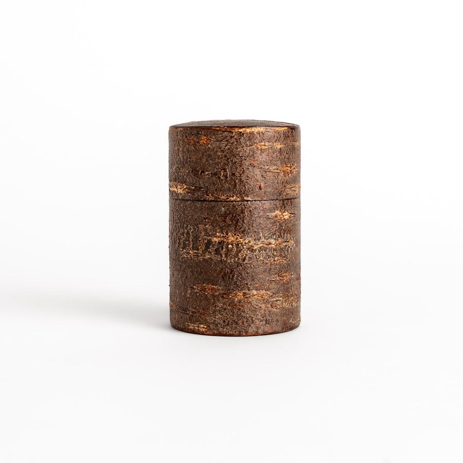 Rustic cherry bark tea canister with deep brown finish and texture ideal for storing loose leaf tea.