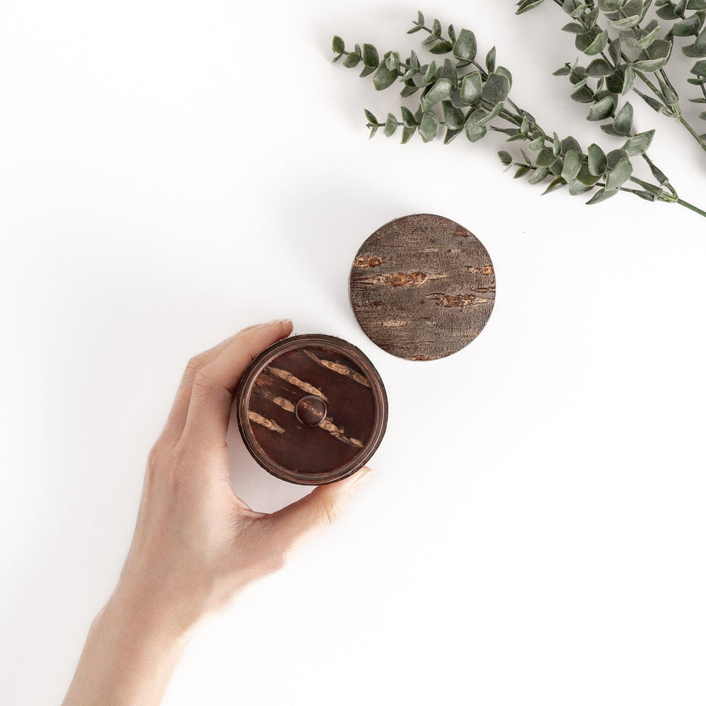 Rustic cherry bark tea canister with deep brown finish and texture ideal for storing loose leaf tea.