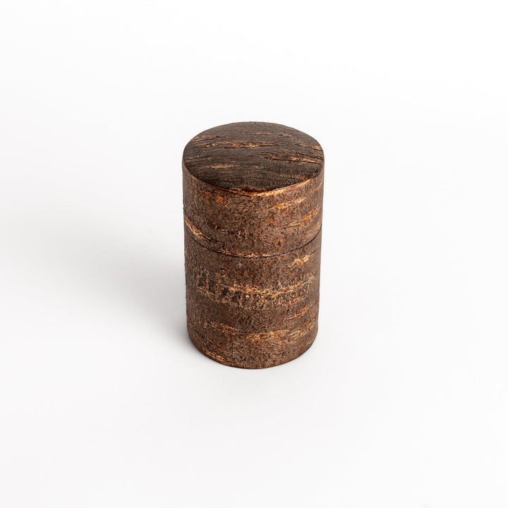 Rustic cherry bark tea canister with deep brown finish and texture ideal for storing loose leaf tea.