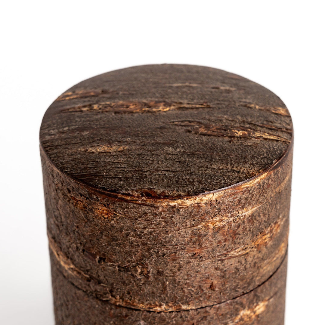Rustic cherry bark tea canister with deep brown finish and texture ideal for storing loose leaf tea.