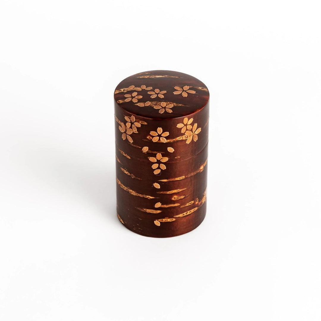 Cherry bark tea canister with cherry blossom design perfect for storing and preserving loose leaf tea.