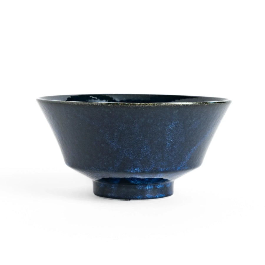 Midnight blue ramen bowl with a glossy glaze, featuring a subtle, textured finish and a slight footed base for stability.
