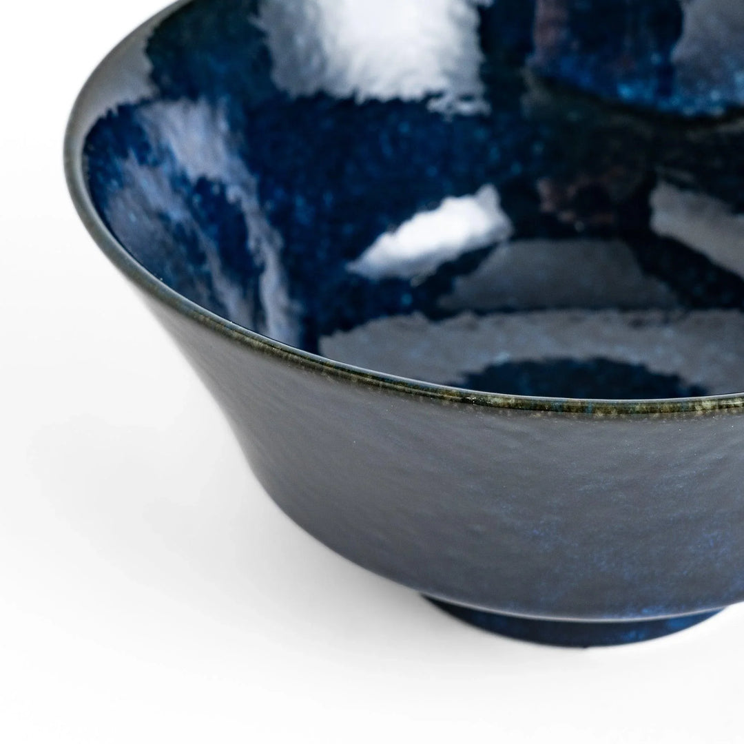 Midnight blue ramen bowl with a glossy glaze, featuring a subtle, textured finish and a slight footed base for stability.