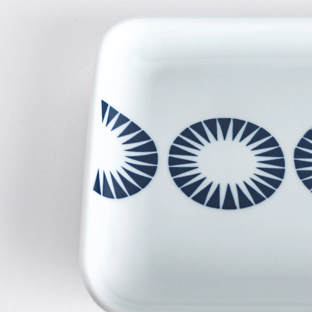 Close-up of the Modern Indigo Circle Dinner Plate, focusing on the detailed navy blue concentric circles.