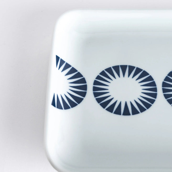 Close-up of the Modern Indigo Circle Dinner Plate, focusing on the detailed navy blue concentric circles.