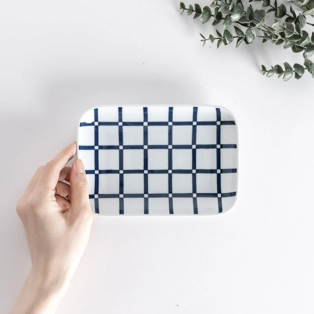 Modern Indigo Lattice dessert plate featuring geometric indigo lattice pattern on white porcelain surface.