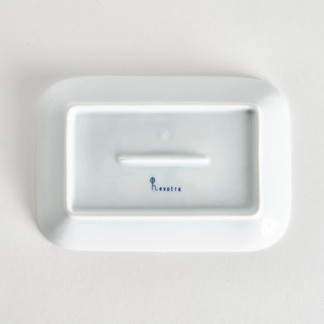 Modern Indigo Lattice dessert plate featuring geometric indigo lattice pattern on white porcelain surface.