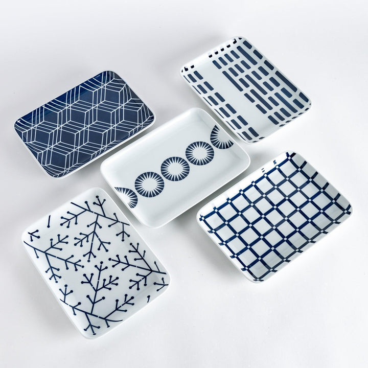 Modern Indigo Lattice dinner plate featuring bold geometric indigo lattice pattern on white porcelain.