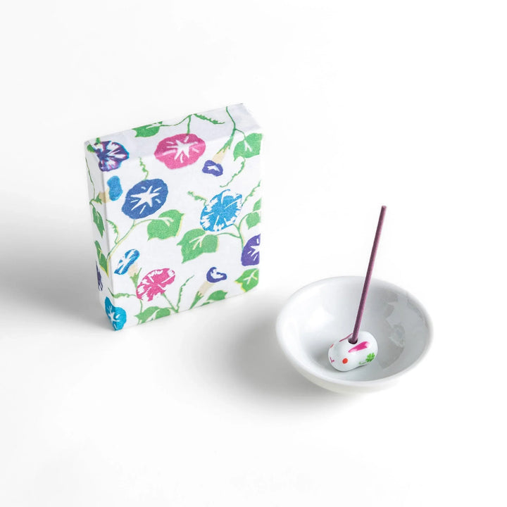 Incense with purple sticks in a morning glory design box offering a floral fragrance inspired by early summer mornings.