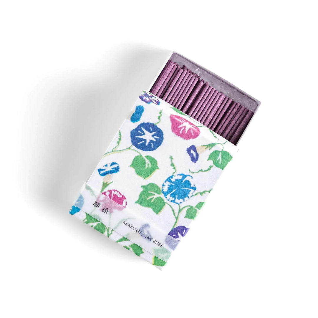 Incense with purple sticks in a morning glory design box offering a floral fragrance inspired by early summer mornings.