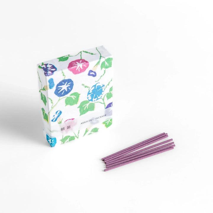 Incense with purple sticks in a morning glory design box offering a floral fragrance inspired by early summer mornings.