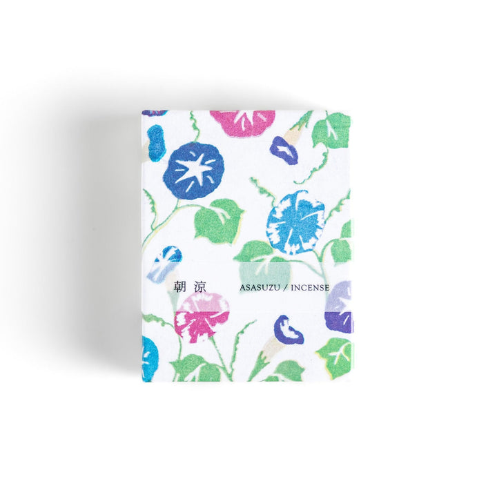 Incense with purple sticks in a morning glory design box offering a floral fragrance inspired by early summer mornings.