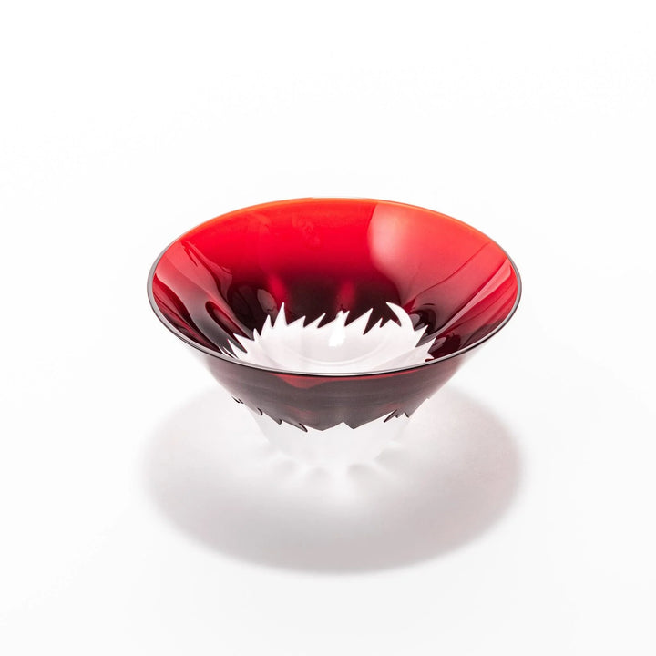 Red glass sake cup shaped like Mount Fuji with a frosted snowcap, ideal for elegant Japanese-style celebrations.