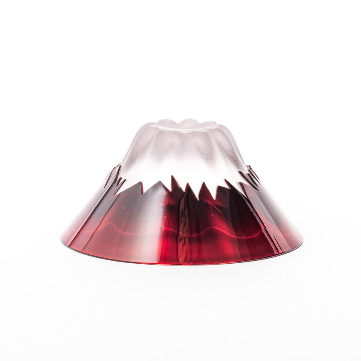 Red glass sake cup shaped like Mount Fuji with a frosted snowcap, ideal for elegant Japanese-style celebrations.