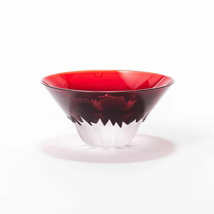 Red glass sake cup shaped like Mount Fuji with a frosted snowcap, perfect for elegant Japanese celebrations.