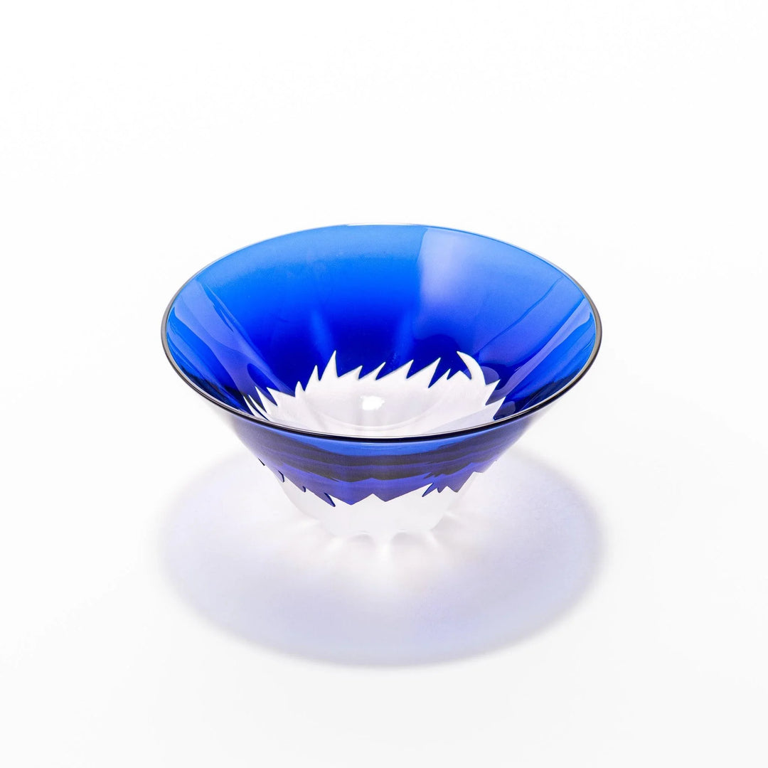 Blue glass sake cup shaped like Mount Fuji with frosted snowcap, ideal for festive and authentic Japanese dining.