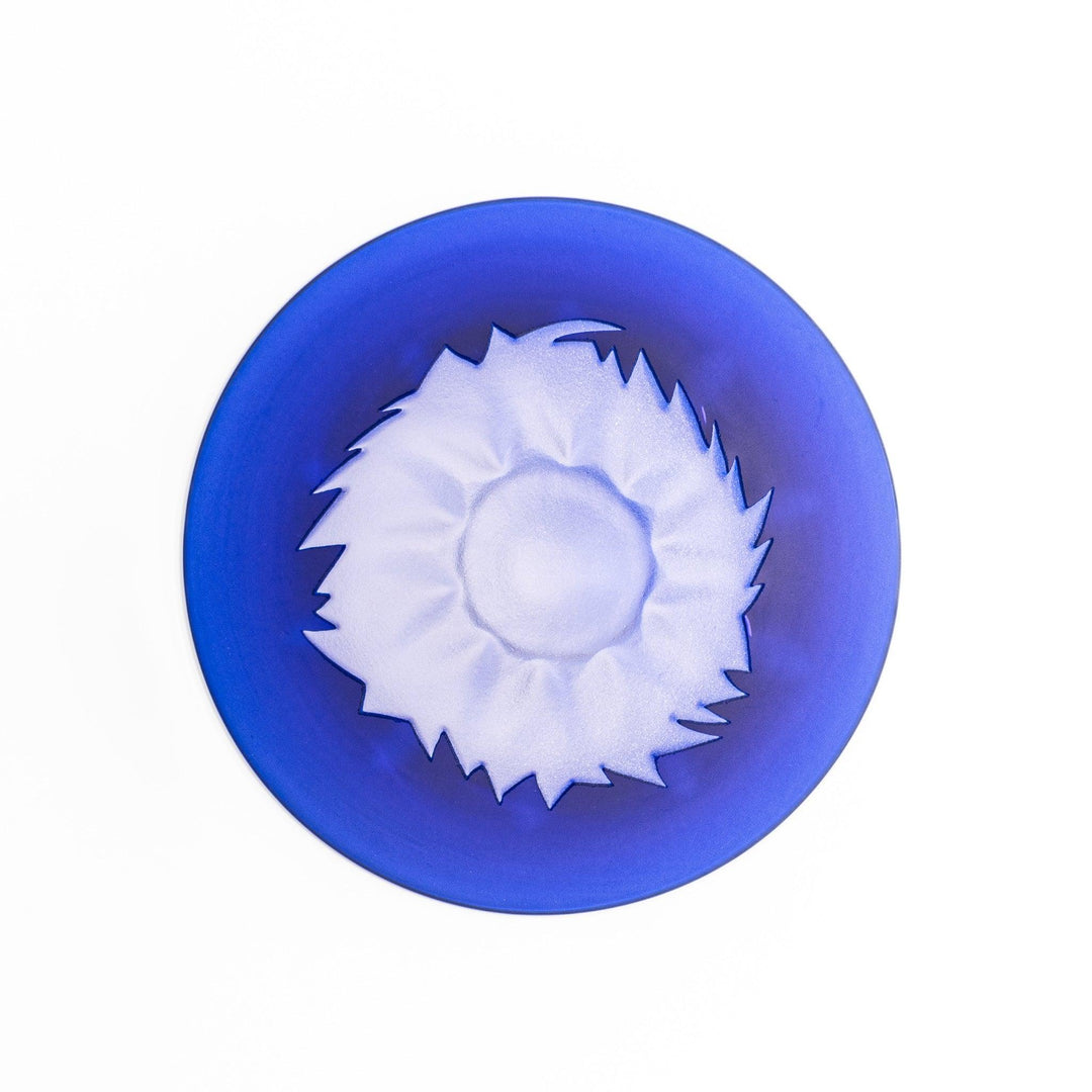 Blue glass sake cup shaped like Mount Fuji with frosted snowcap, ideal for festive and authentic Japanese dining.