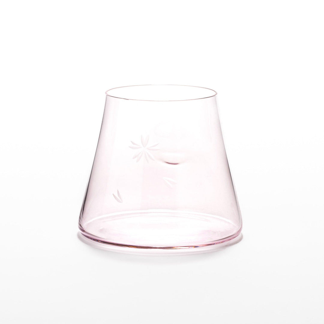 Light pink Mount Fuji beer glass with etched cherry blossoms, perfect for spring drinks and elegant settings.