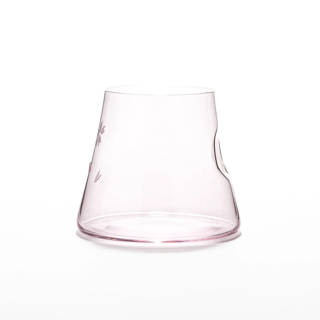 Light pink Mount Fuji beer glass with etched cherry blossoms, perfect for spring drinks and elegant settings.