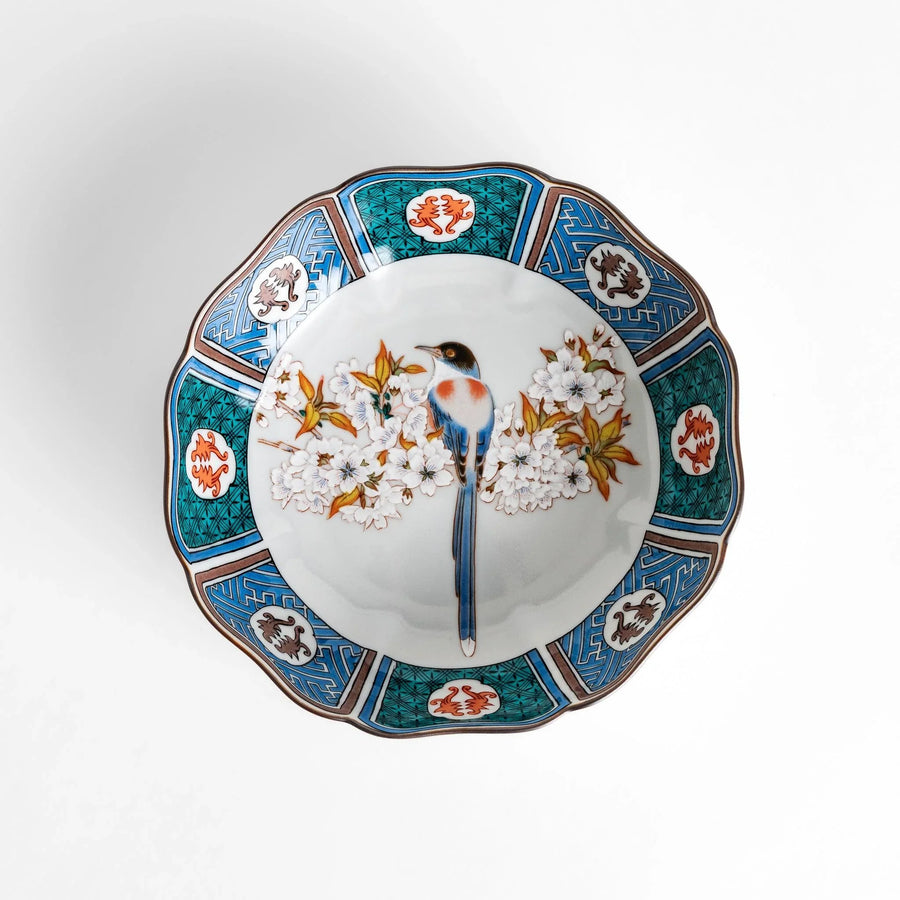 Cereal Bowl featuring a vibrant bird perched on blossoming sakura flowers, framed by intricate blue patterns.