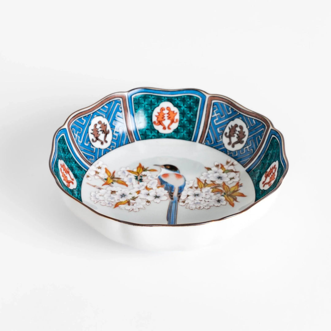 Cereal Bowl featuring a vibrant bird perched on blossoming sakura flowers, framed by intricate blue patterns.