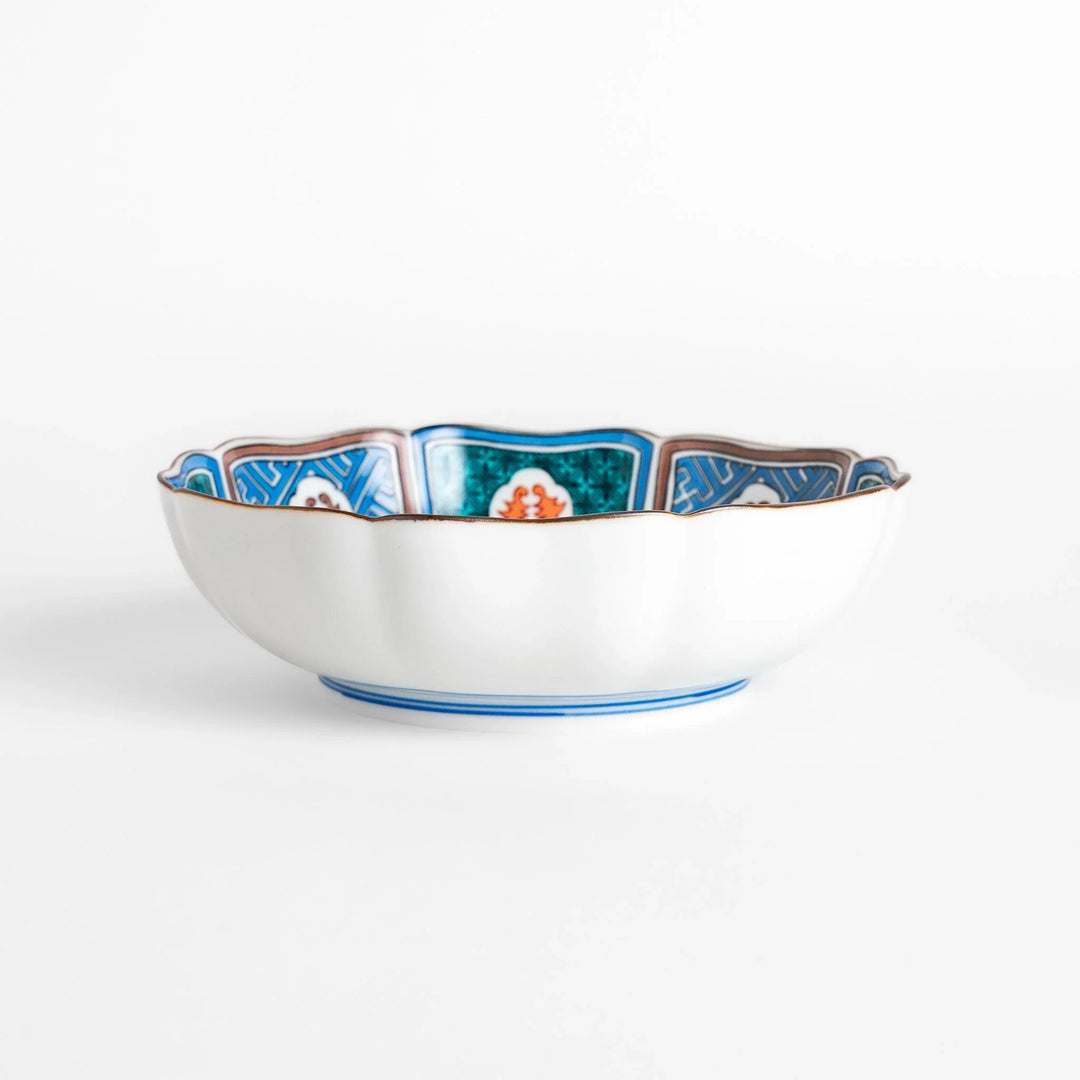 Cereal Bowl featuring a vibrant bird perched on blossoming sakura flowers, framed by intricate blue patterns.